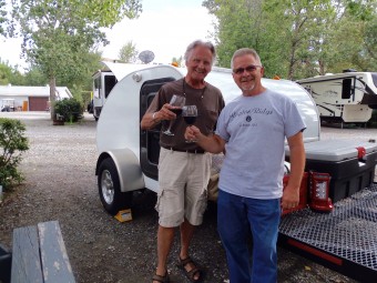 My travel partner, John Lewis and I sharing a bottle of wine our first night on the road in Cache Creek, BC.